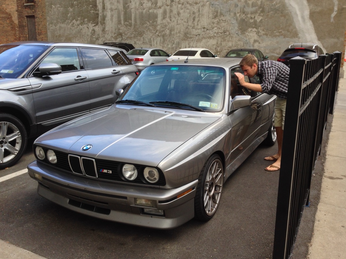 A parked car in a large parking lot